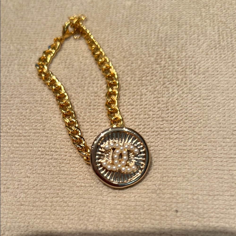 Gold and Silver Chain Link Bracelet with CHANEL charm. For  a little girl.